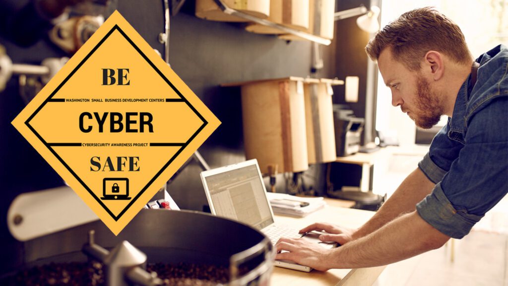 Small business owner using a laptop with a “Be Cyber Safe” cybersecurity awareness graphic.